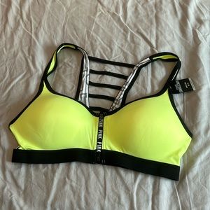 Victoria’s Secret pink sports bra, medium unworn zip front